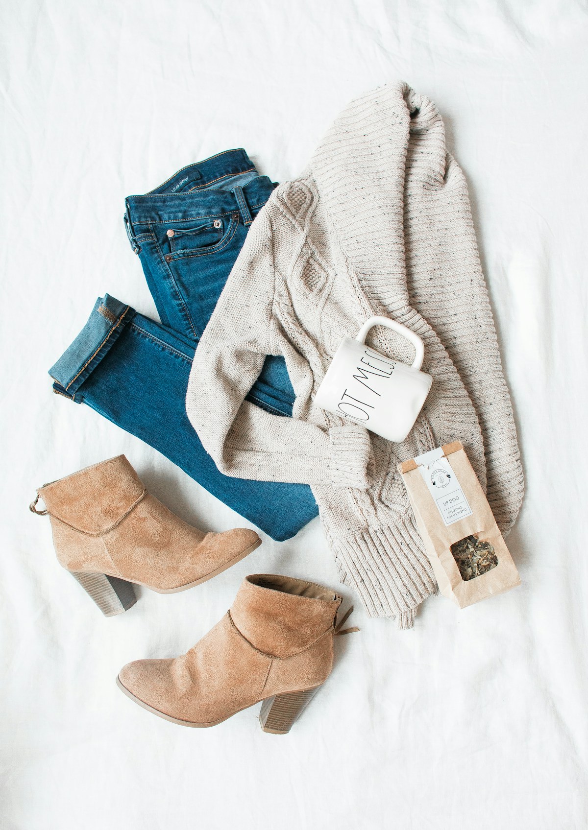 cashmere knit sweater flatlay showing fibre quality and grade